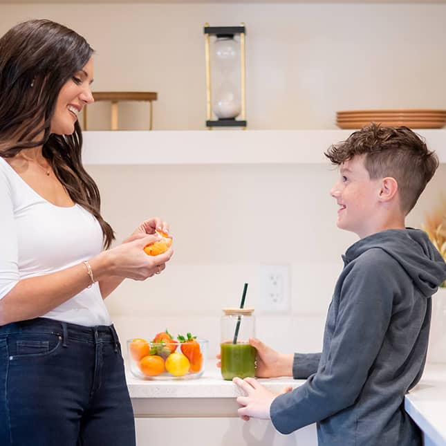 Megan with her family in the kitchen